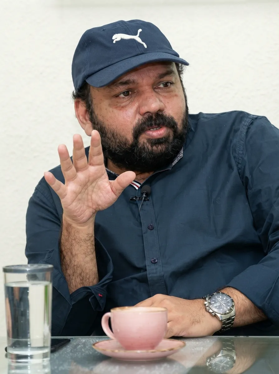 Portrait of Santhosh George Kulangara